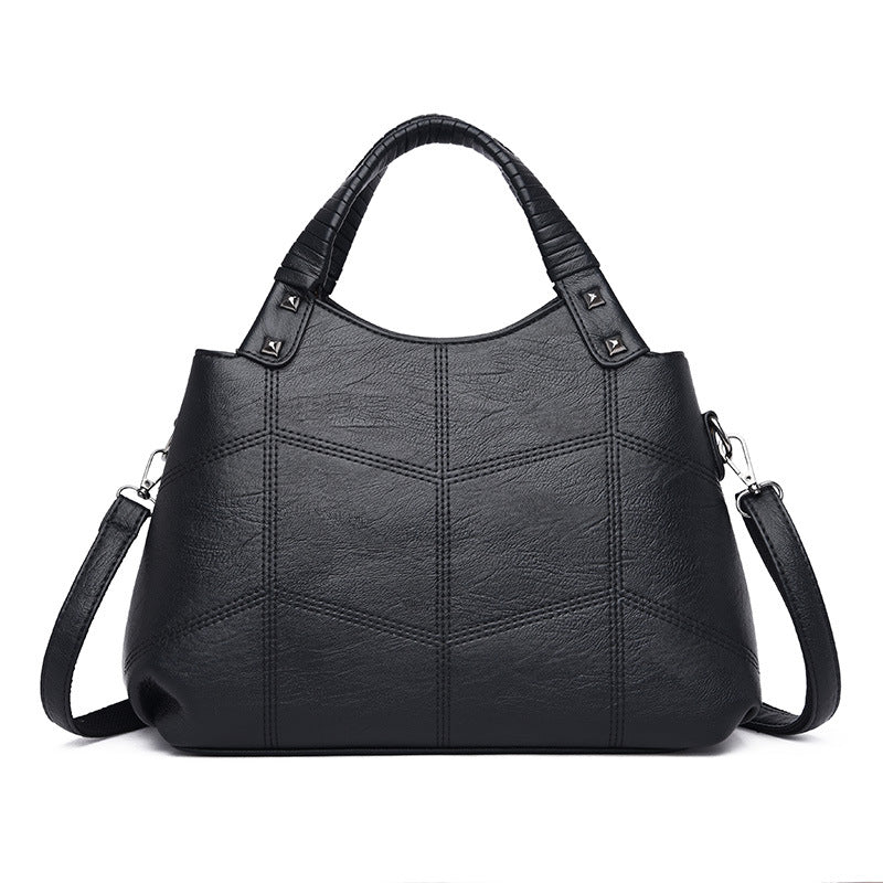 Leather handle shoulder bag